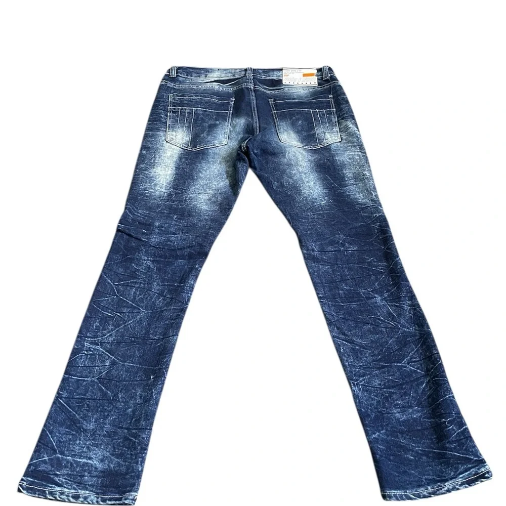 Blue Bootcut Jeans with Distressed Details